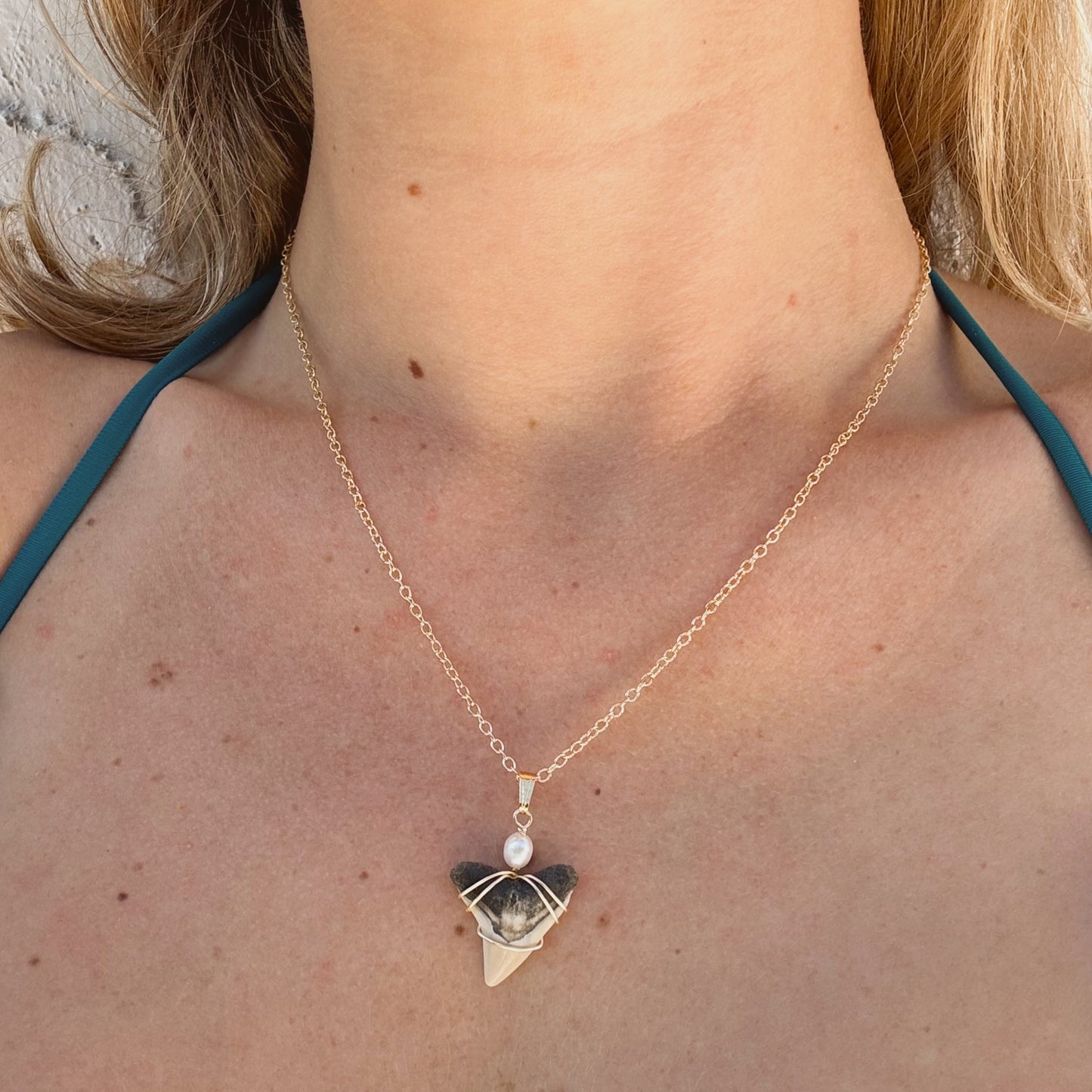 bullshark and pearl necklace