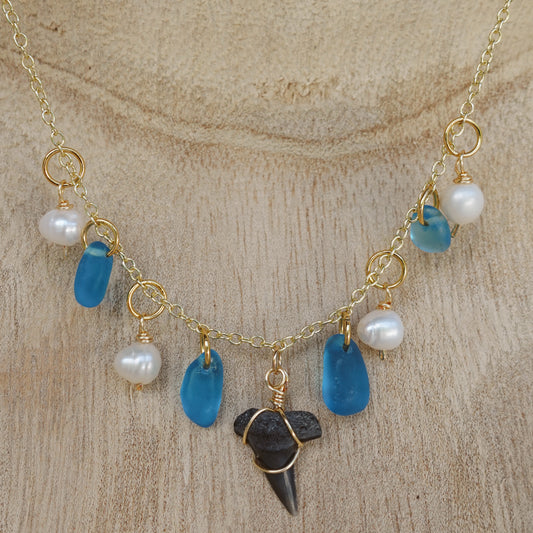 fossil tooth and glass charm necklace
