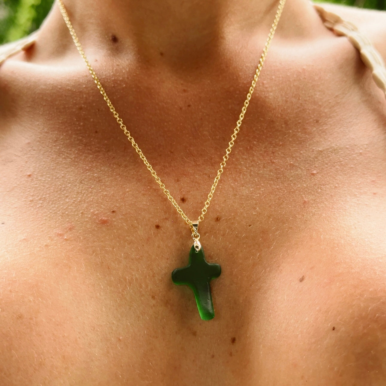 hand carved sea glass cross necklace