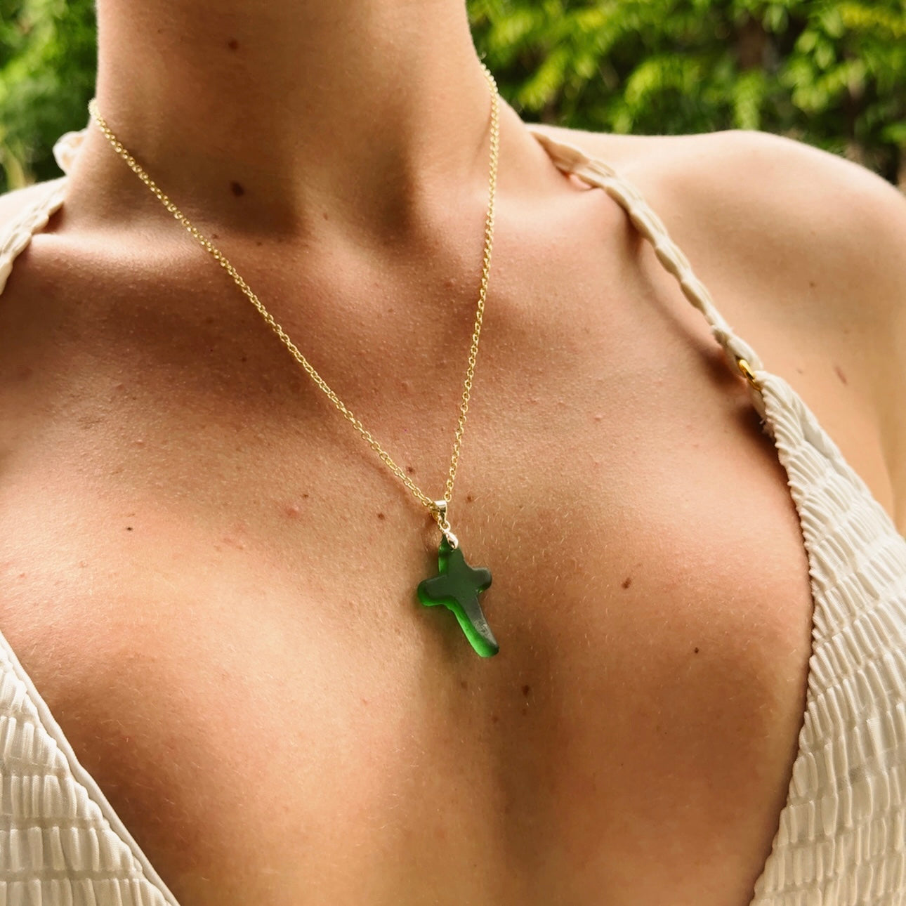 hand carved sea glass cross necklace