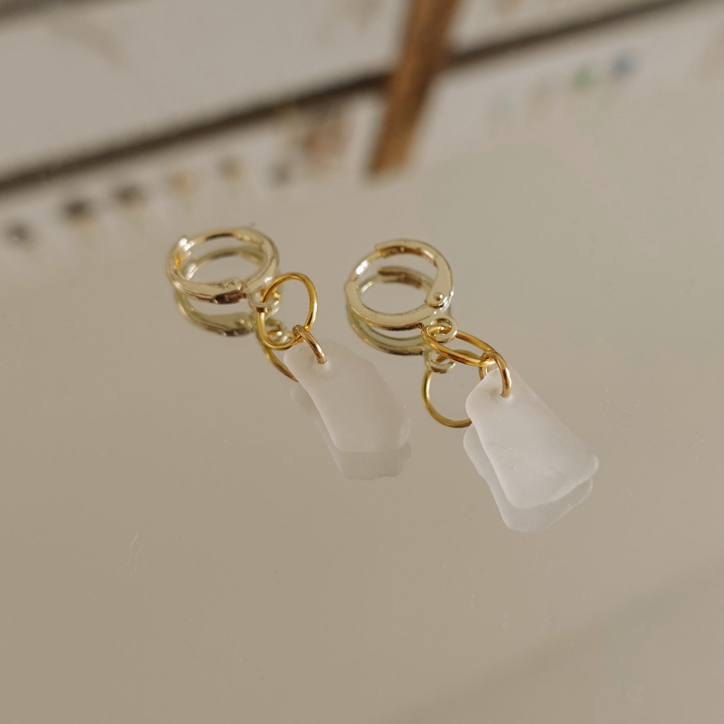 clear sea glass drop earrings